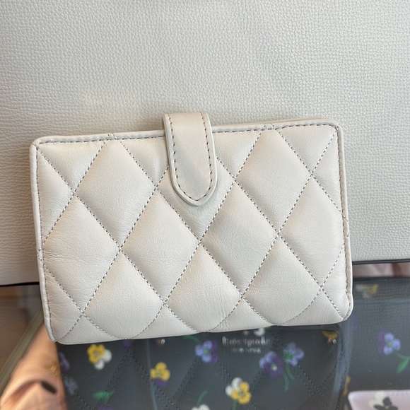 Kate Spade Carey Medium Compartment Bifold Wallet 
COLOR: Parchment - Picture 3 of 16